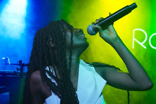 Artist performing live singing at roglobstudios